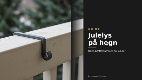 Krog til lyskæde monteret på toppen af et træhegn