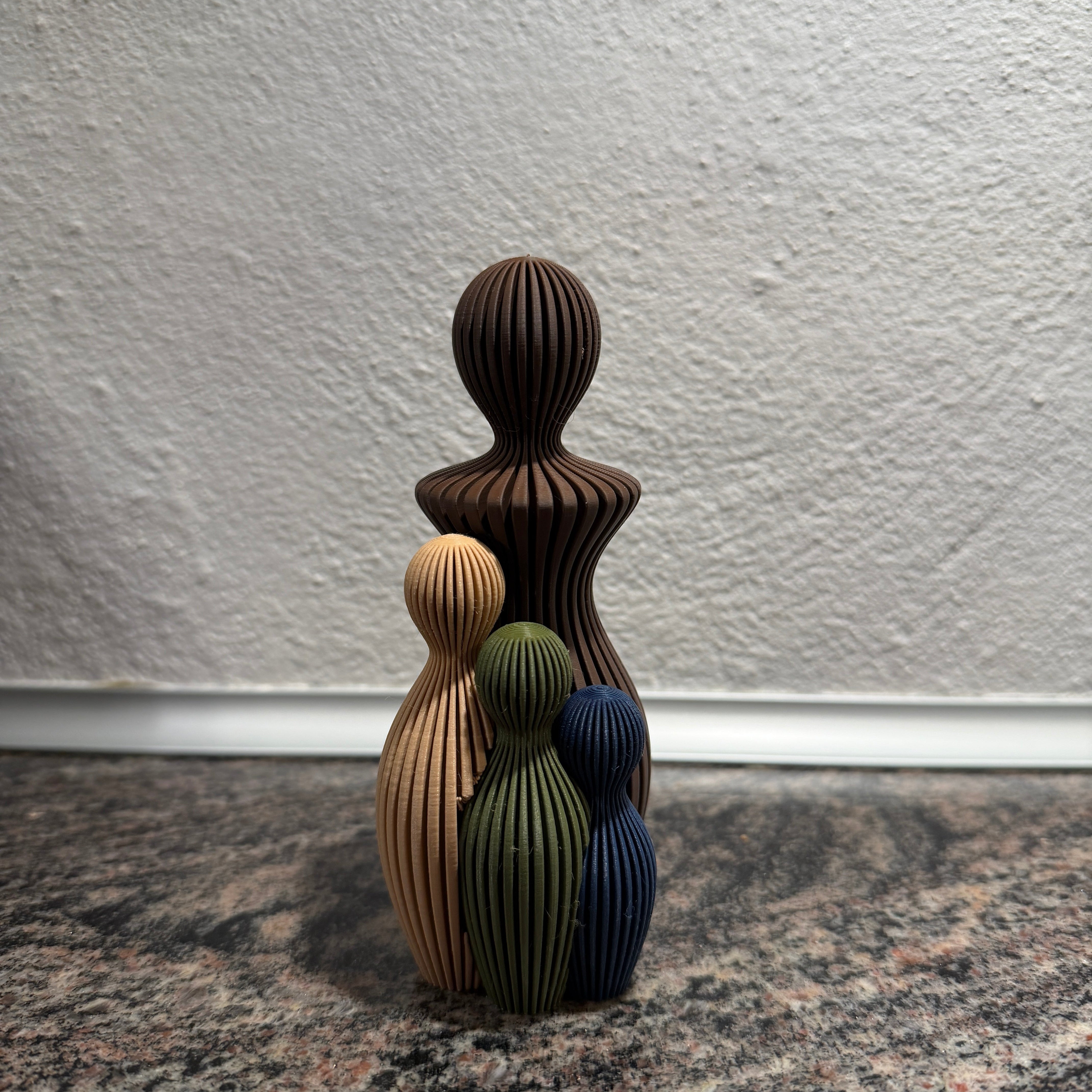 Sabre Mors dag skulptur med 3 børn